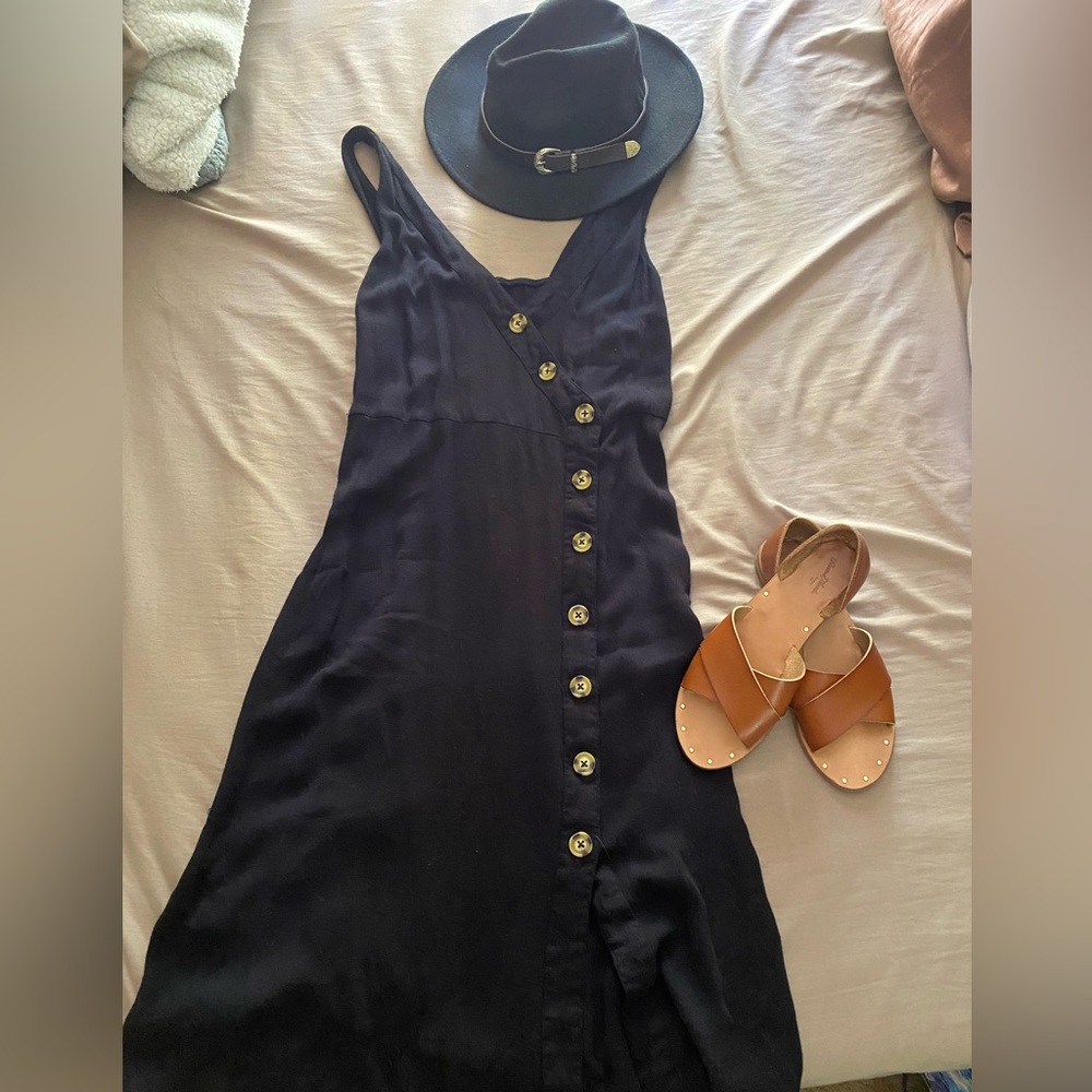 Black midi dress with tortoiseshell style buttons